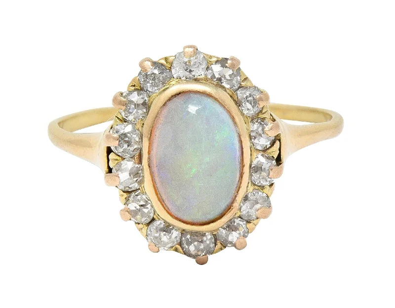 Luxury Jewelry Now At Special Promotional Rates Victorian 0.86 CTW Opal Cabochon Diamond 14 Karat Yellow Gold Antique Halo Ring