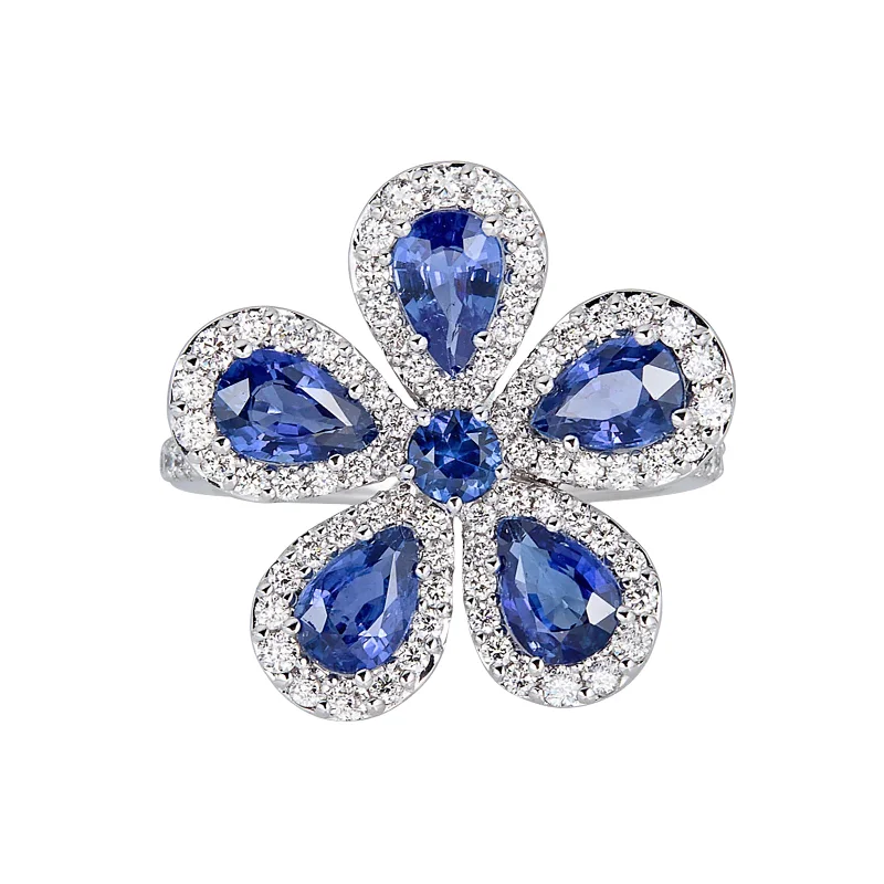 Dazzle In Elegance With Our Biggest Jewelry Sale Classic Flower Ring with Blue Sapphires and Diamonds Dazzle In Elegance With Our Biggest Jewelry Sale Classic Flower Ring with Blue Sapphires and Diamonds