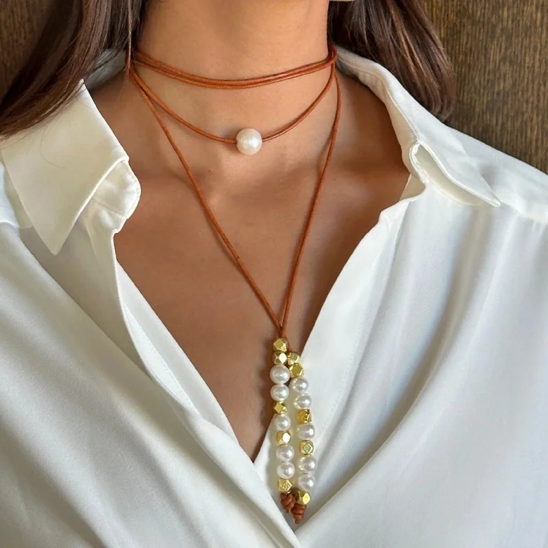Timeless Elegance Now At Special Discounts Leather, Pearl, and Nugget Lariat