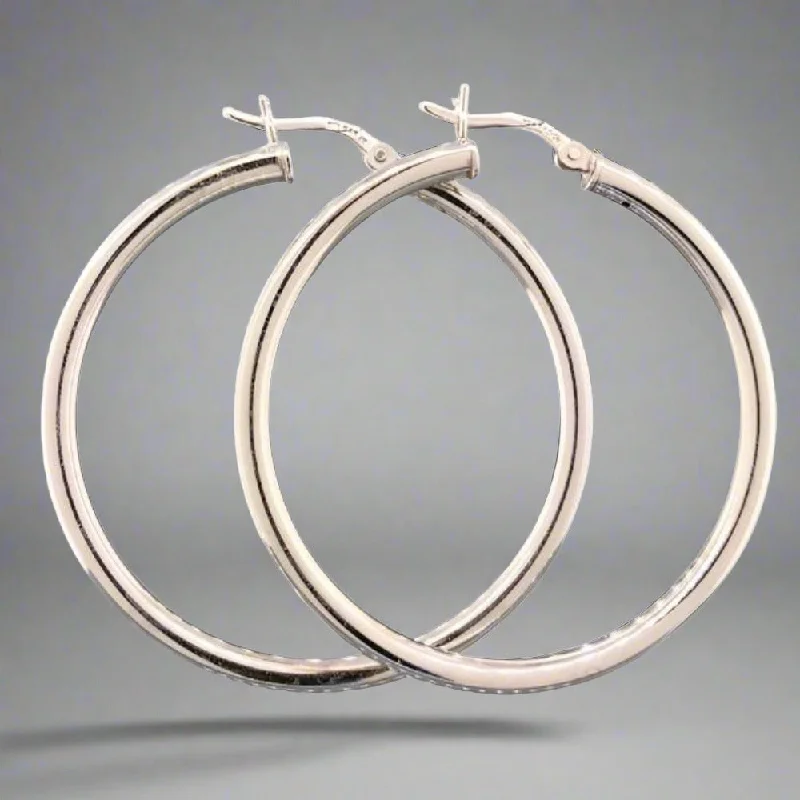 Elegant Jewelry At Unbeatable Offers – Shop Before It's Gone SS 3x40mm Hoop Earring with Hinged Closure. Elegant Jewelry At Unbeatable Offers – Shop Before It's Gone SS 3x40mm Hoop Earring with Hinged Closure.