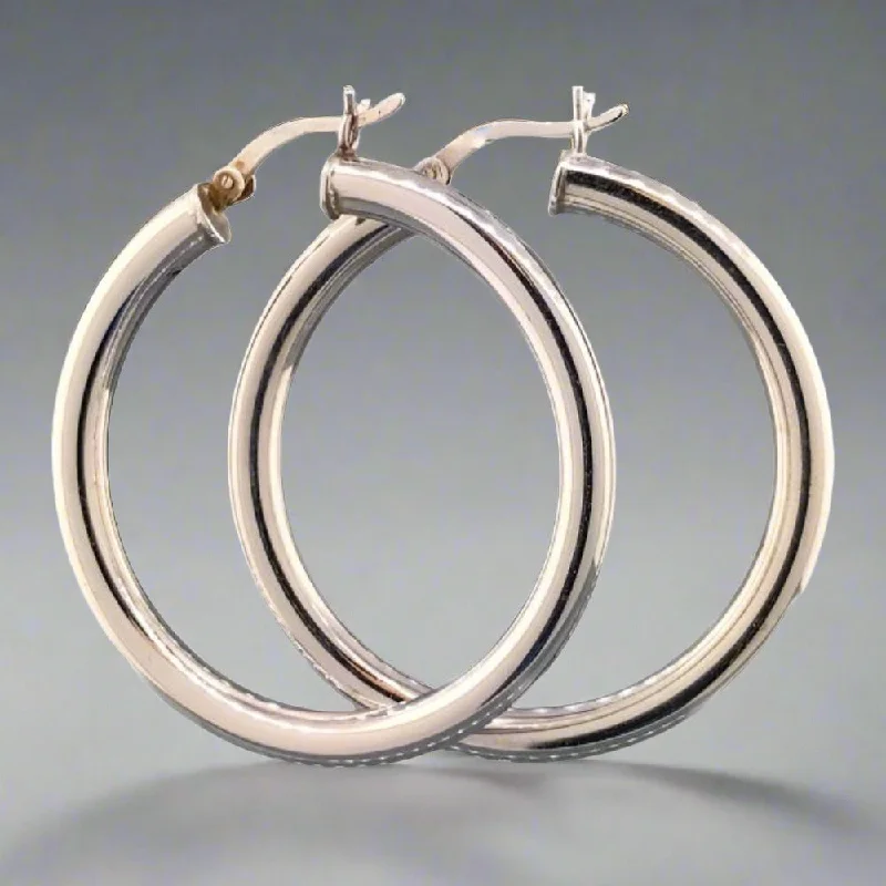 Discounted Luxury Jewelry – Shine Without The Splurge SS 4x35mm Hoop Earring with Hinged Closure. Discounted Luxury Jewelry – Shine Without The Splurge SS 4x35mm Hoop Earring with Hinged Closure.