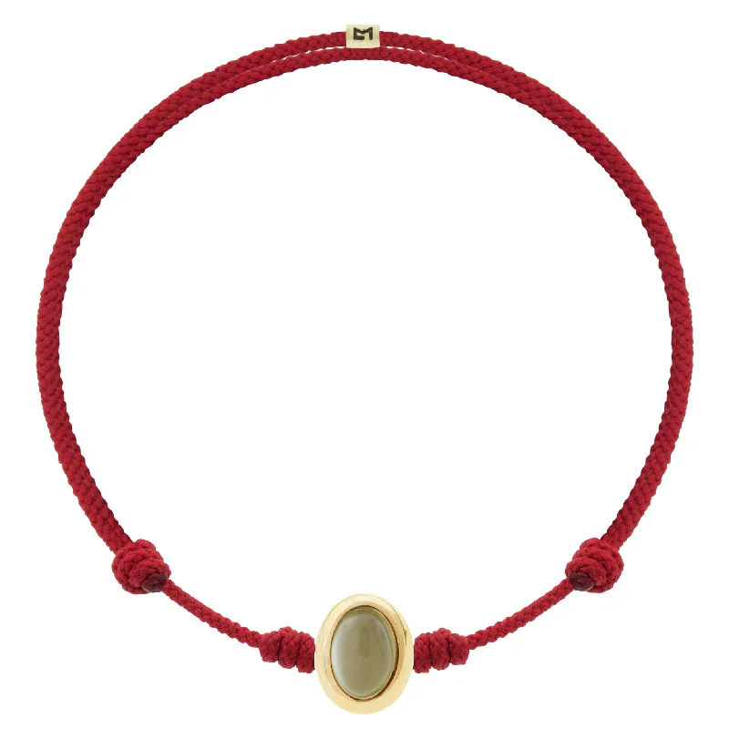 Make Your Outfit Shine With Discounted Jewelry Moonstone Oval Cabochon on Red Cord Bracelet Make Your Outfit Shine With Discounted Jewelry Moonstone Oval Cabochon on Red Cord Bracelet