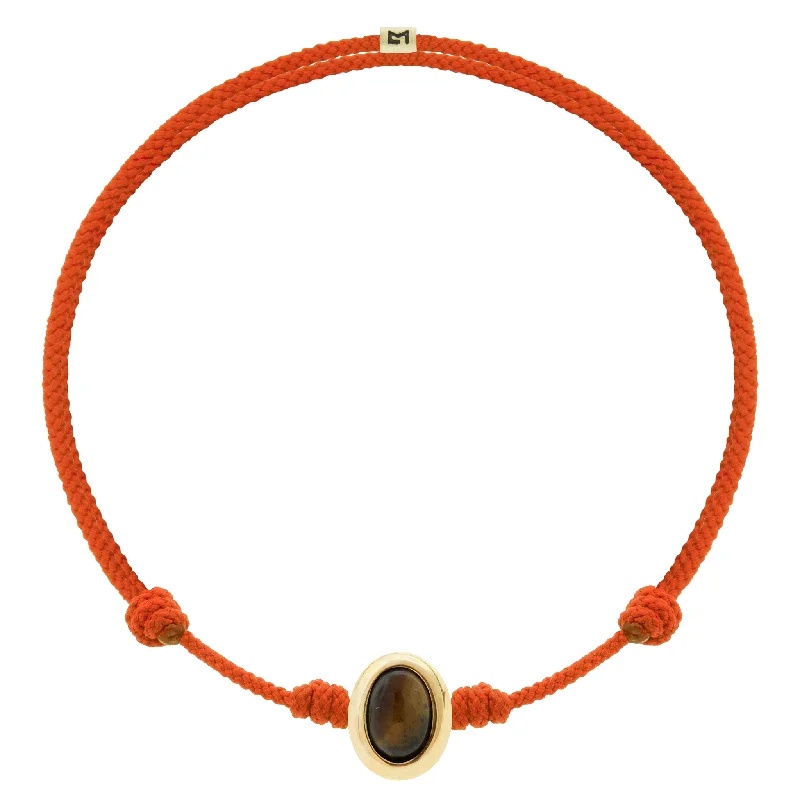 Stunning Jewelry At Even More Stunning Prices Oval Tiger's Eye Cabochon on Orange Cord Bracelet Stunning Jewelry At Even More Stunning Prices Oval Tiger's Eye Cabochon on Orange Cord Bracelet