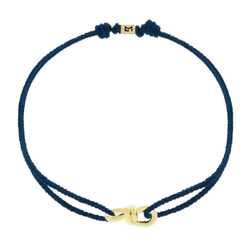Elevate Your Outfit With Discounted Statement Jewelry Small Twisted Gold Knot on Navy Cord Bracelet Elevate Your Outfit With Discounted Statement Jewelry Small Twisted Gold Knot on Navy Cord Bracelet