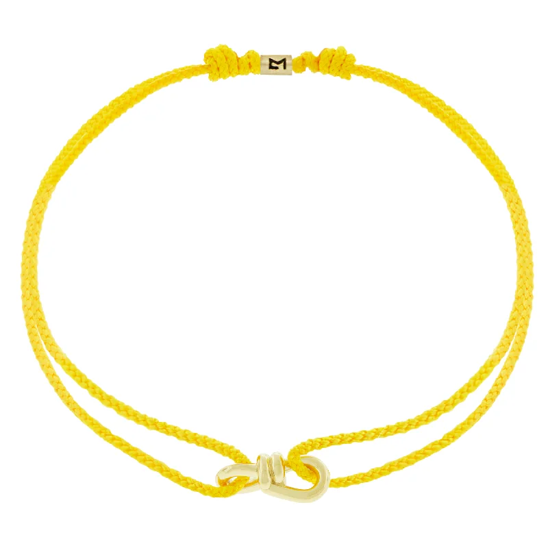 Celebrate Every Occasion With Sparkling Savings Small Twisted Gold Knot on Yellow Cord Bracelet Celebrate Every Occasion With Sparkling Savings Small Twisted Gold Knot on Yellow Cord Bracelet